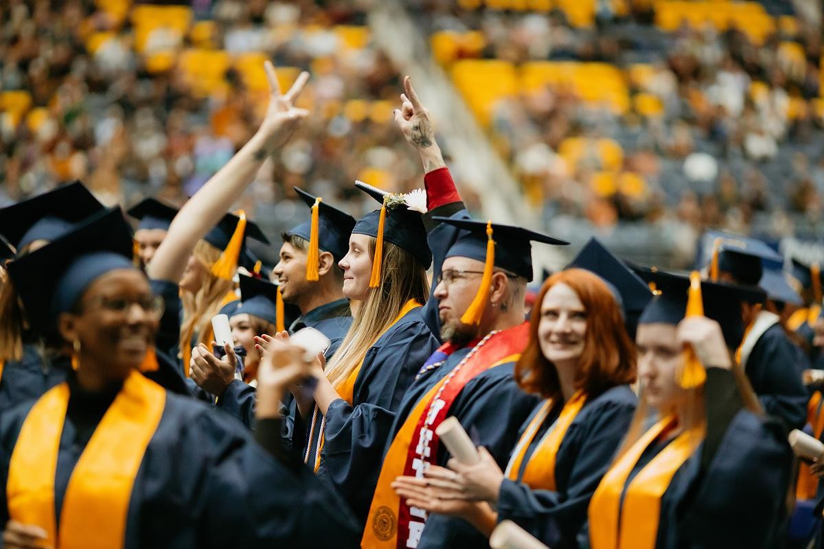 NAU graduation caps for Master's scholarship cohort